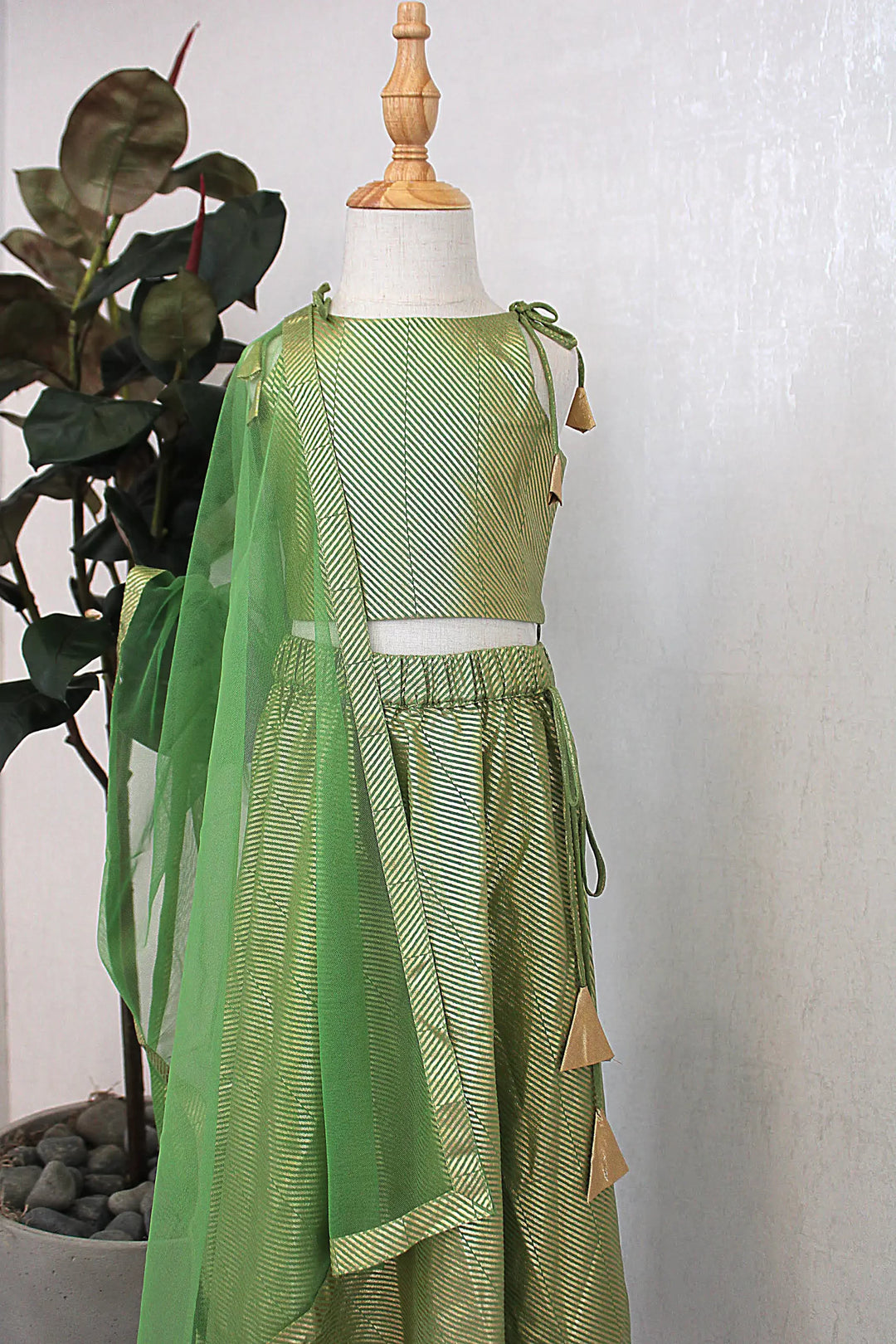 Green Stringlet Lehenga with Dupatta and Potli